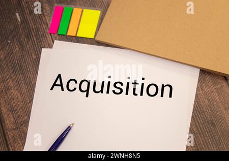 Acquisizione evidenziata in verde, sotto l'intestazione acquisizione Foto Stock
