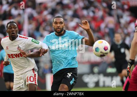 Faride Alidou Köln, Jonathan Tah Bayer, Köln, Deutschland, 03.03.2024, 1) Bundesliga 24. Spieltag, 1. FC Köln - Bayer 04 Leverkusen. LE NORMATIVE DFL VIETANO QUALSIASI USO DI FOTOGRAFIE COME SEQUENZE DI IMMAGINI E/O QUASI-VIDEO BUNDESLIGA 1. FC Köln vs Bayer Leverkusen *** Faride Alidou Köln , Jonathan Tah Bayer , Colonia, Germania, 03 03 2024, 1 Bundesliga 24 Matchday, 1 FC Köln Bayer 04 Leverkusen I REGOLAMENTI DFL VIETANO QUALSIASI USO DI FOTOGRAFIE COME SEQUENZE DI IMMAGINI E/O QUASI VIDEO Bundesliga 1 FC Köln vs Bayer Leverkusen Foto Stock