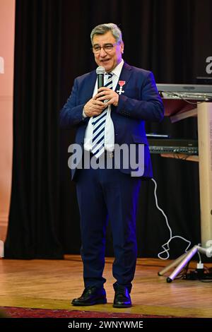 Chiswick Town Hall, Londra, Regno Unito. 4 marzo 2024: Oratore Dr Nooralhaq Nasimi MBE, fondatore e direttore dell'Afghanistan and Central Asian Association (ACAA) presso l'Afghanistan and Central Asian Association (ACAA) ospita una giornata internazionale della donna 2024 chiamata Women: Identity, Integration, and Inclusion. L'evento internazionale delle donne di quest'anno è incentrato sulla "Inspiring Inclusion", un evento culturale che celebra i punti di forza e le conquiste delle donne migranti. La serata sarà caratterizzata da relatori, esibizioni di musica e danza, recitazione di poesie e una sfilata di donne rifugiate di Foto Stock