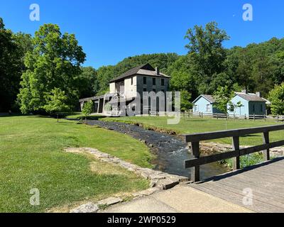 1800 edifici storici accanto a un torrente nello Spring Mill State Park Foto Stock