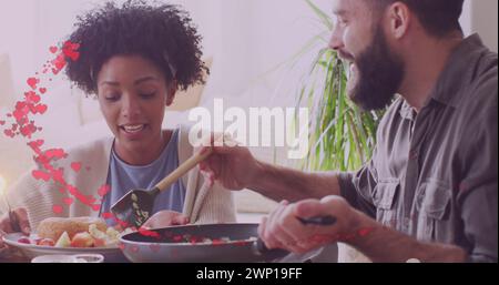 Immagine di cuori che mangiano insieme diverse coppie Foto Stock