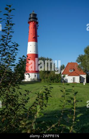 Faro sull'isola di Pellworm, Frisia settentrionale, Schleswig-Holstein, Germania Foto Stock