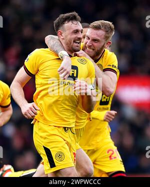 Jack Robinson dello Sheffield United celebra il secondo gol della squadra con i compagni di squadra durante la partita di Premier League al Vitality Stadium di Bournemouth. Data foto: Sabato 9 marzo 2024. Foto Stock