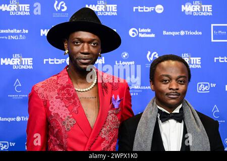 Bruxelles, Belgio. 9 marzo 2024. Il musicista e regista belga Baloji e l'attore Marc Zinga fotografati sul tappeto blu all'arrivo della tredicesima edizione della cerimonia di premiazione del film "Magritte du Cinema", sabato 9 marzo 2024, a Bruxelles. I premi sono premiati per i film di produttori belgi francofoni. BELGA PHOTO LAURIE DIEFFEMBACQ credito: Belga News Agency/Alamy Live News Foto Stock