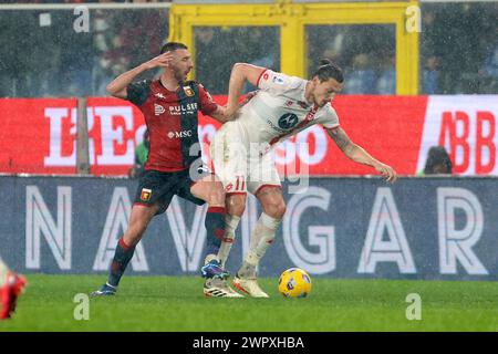 Genova, Italia. 9 marzo 2024. Foto Tano Pecoraro/LaPresse 09 marzo 2024 Genova, Italia - sport, calcio - Genova vs Monza - Campionato di calcio serie A TIM 2023/2024 - Stadio Luigi Ferraris. Nella foto: bani mattia, djuric milano 9 marzo 2024 Genova, Italia - sport, calcio - Genova vs Monza - Campionato Italiano di calcio di serie A 2023/2024 - Stadio Luigi Ferraris. Nella foto: bani mattia, djuric milano crediti: LaPresse/Alamy Live News Foto Stock