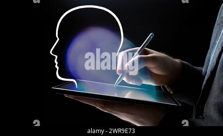 L'uomo d'affari utilizza il pad per laptop con l'applicazione ai. L'uomo usa l'intelligenza artificiale su un dispositivo mobile Foto Stock