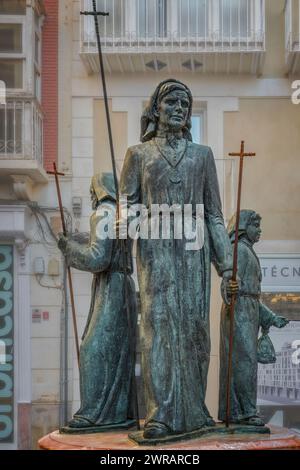 Monumento al Processista, gruppo scultoreo in bronzo di Manuel Ardil Pagan esposto in Plaza de San Sebastian nella città di Cartagena, Murcia. Foto Stock