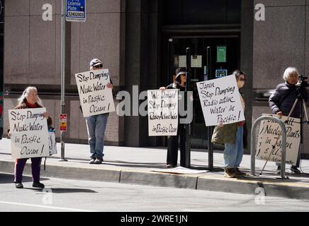 San Francisco, Stati Uniti. 11 marzo 2024. Le persone prendono parte a una manifestazione contro lo scarico oceanico giapponese delle acque reflue contaminate dal nucleare di Fukushima di fronte al Consolato generale del Giappone a San Francisco, California, Stati Uniti, 11 marzo 2024. Crediti: Li Jianguo/Xinhua/Alamy Live News Foto Stock