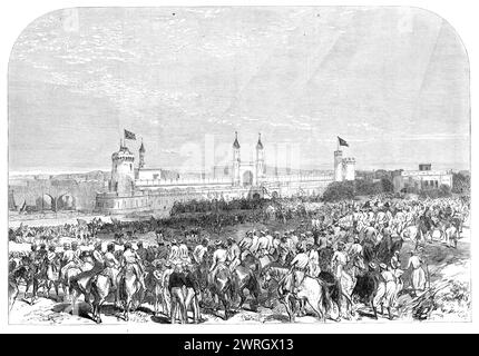 Arrivo del Governatore generale dell'India alla stazione ferroviaria di Lahore, 1864. Incisione di una fotografia dei signori Raybon e West. '...questa visita è stata resa un'occasione per grandi festeggiamenti... il Punjaub... è il grande baluardo dell'India britannica... non ha solo una popolazione di 15.000.000... immediatamente soggetta al nostro governo, ma contiene all'interno dei suoi confini 7.000.000 persone che possiedono fedeltà ai capi nativi, rendendo l'intera popolazione per la cui pace e benessere i rappresentanti della regina Vittoria sono responsabili nel Punjaub quasi lo stesso numero degli abitanti della grande Britannia Foto Stock