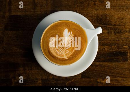 Caffelatte con latte art Foto Stock