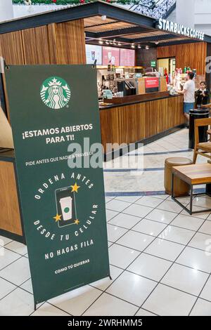 Merida Mexico, Gonzalo Guerrero Calle 50, Gran Plaza Merida, interni, caffè Starbucks, pubblicità banner pubblicitari, non aspettare Ordina tramite app Foto Stock