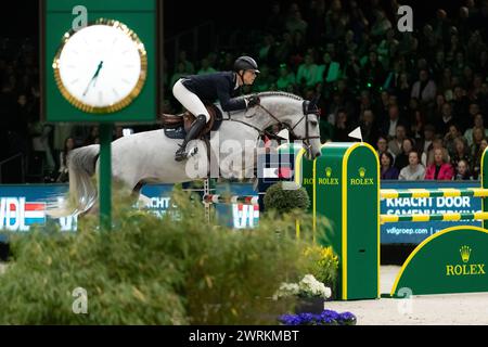 DenBosch, Paesi Bassi - 9 marzo 2024. Max Kuhner dell'Austria in sella a EIC Quantum Robin V gareggia nella classe Indoor Derby di 1,45 m al 2024 olandese Mas Foto Stock