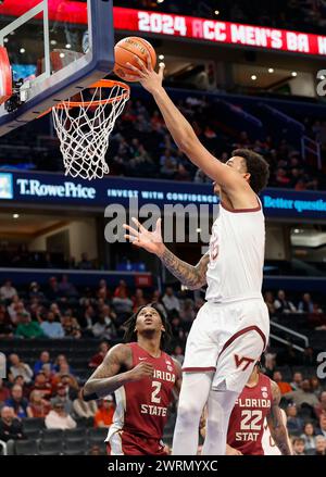 13 marzo 2024: Virginia Tech Hokies Center (15) Lynn Kidd porta la palla al cerchio durante una partita del torneo di pallacanestro maschile ACC tra i Virginia Tech Hokies e i Florida State Seminoles alla Capital One Arena di Washington, DC Justin Cooper/CSM Foto Stock