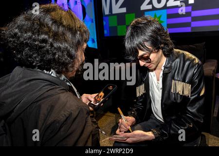 Austin, Stati Uniti. 13 marzo 2024. Xavier de Rosnay, di Justice, firma autografi alla "Featured Session: Justice: In Conversation" durante il South by Southwest 2024 ad Austin, Texas, mercoledì 13 marzo 2024. (Travis P Ball/Sipa USA) credito: SIPA USA/Alamy Live News Foto Stock