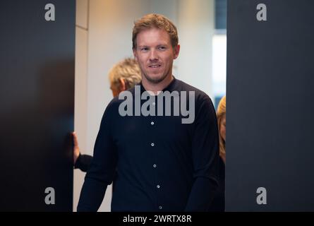 14 marzo 2024, Assia, Francoforte sul meno: L'allenatore tedesco Julian Nagelsmann presenta la squadra per le amichevoli internazionali a fine marzo in una conferenza stampa. La squadra della DFB giocherà contro la Francia a Lione il 23 marzo e contro i Paesi Bassi a Francoforte il 26 marzo. Foto: Boris Roessler/dpa Foto Stock