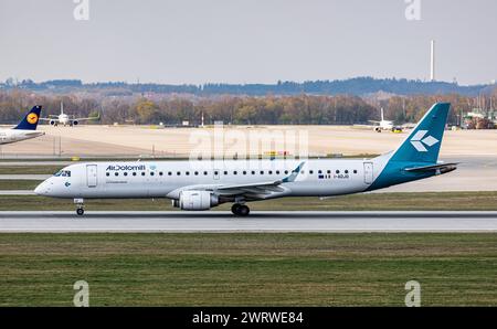 Ein Embraer 195LR von Air Dolomiti startet von der Südbahn des Flughafen München. Immatrikulation i-ADJO. (München, Deutschland, 06.04.2023) Foto Stock