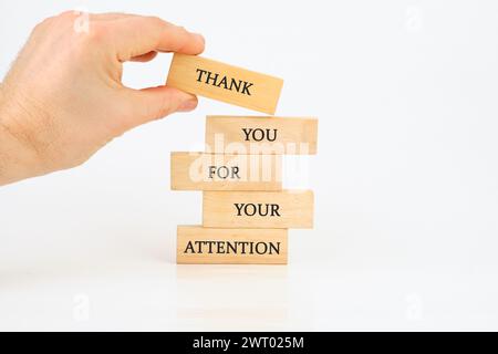 Grazie per la vostra attenzione. Testo scritto su blocchi di legno assemblati a mano Foto Stock