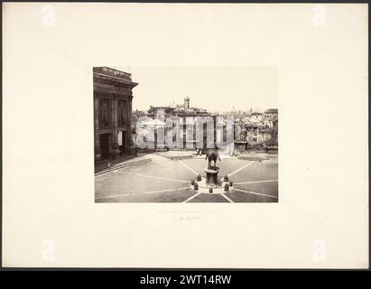 Vista da Campidoglio, Roma. Giorgio Sommer, fotografo (italiano, nato in Germania, 1834 - 1914) intorno al 1860-1865, Una piazza con una statua equestre su un piedistallo, vista da dietro. File di mattoni si estendono dalla statua attraverso la piazza, formando uno schema stellare. La piazza è sollevata dal resto della città, che può essere vista oltre e sotto la statua. (Recto, Mount) centro inferiore, lettera nera: "VISTA DA CAMPIDOGLIO, ROMA."; centro inferiore, matita: "Il Campidoglio"; (verso, mount) in basso a sinistra, matita: "26 [cerchiato e parzialmente cancellato]"; in basso a destra, matita: "27"; Foto Stock