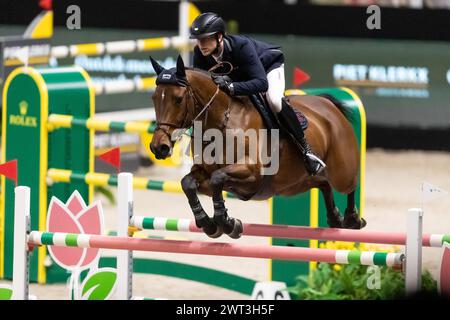 Denbosch, Paesi Bassi - 10 marzo 2024. Max Kuhner dell'Austria e in sella a EIC anche Jacco Blue gareggia nel Rolex Grand Prix di 1,60 m al ruolo 2024 Foto Stock