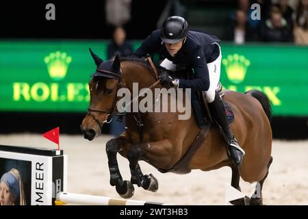 Denbosch, Paesi Bassi - 10 marzo 2024. Max Kuhner dell'Austria e in sella a EIC anche Jacco Blue gareggia nel Rolex Grand Prix di 1,60 m al ruolo 2024 Foto Stock