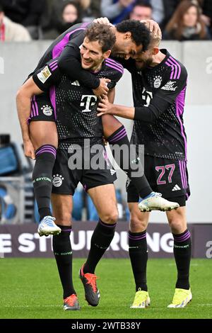 Darmstadt, Germania. 16 marzo 2024. Serge Gnabry (Top) del Bayern Monaco celebra il gol con i compagni di squadra durante una partita di calcio tedesca di prima divisione tra SV Darmstadt 98 e Bayern Monaco a Darmstadt, Germania, 16 marzo 2024. Crediti: Ulrich Hufnagel/Xinhua/Alamy Live News Foto Stock