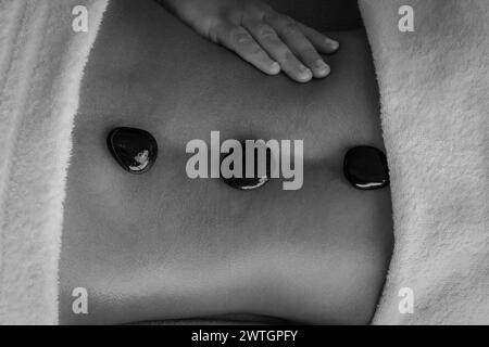 Donna con un massaggio Foto Stock