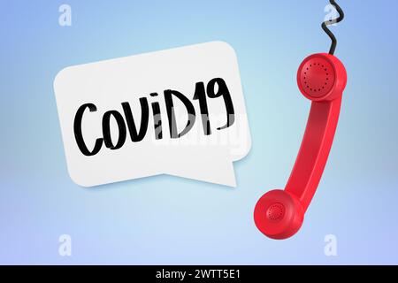 Ricevitore telefonico rosso con testo COVID-19 in bolla vocale Foto Stock
