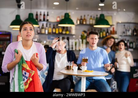 I tifosi portoghesi sono sconvolti dalla perdita della loro squadra preferita Foto Stock