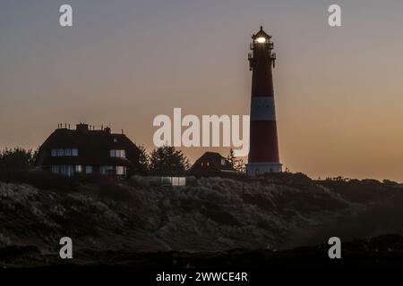 Germania, Schleswig-Holstein, Hornum, faro sull'isola Sylt all'alba Foto Stock