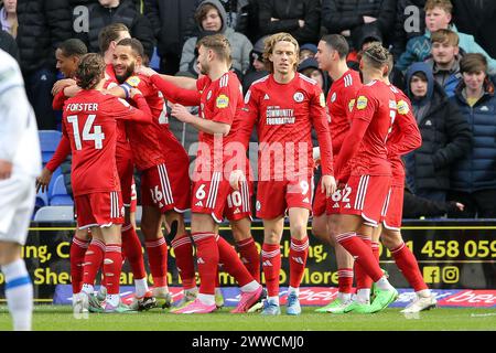 Birkenhead, Regno Unito. 23 marzo 2024. Jay Williams di Crawley Town (26) festeggia con i suoi compagni di squadra dopo aver segnato il secondo gol della sua squadra. EFL Skybet Football League Two Match, Tranmere Rovers contro Crawley Town a Prenton Park, Birkenhead, Wirral sabato 23 marzo 2024. Questa immagine può essere utilizzata solo per scopi editoriali. Solo per uso editoriale, .pic di Chris Stading/ credito: Andrew Orchard fotografia sportiva/Alamy Live News Foto Stock