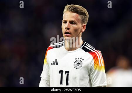 Lione, Francia. 23 marzo 2024. Calcio: Partite internazionali, Francia - Germania, Groupama Stadium. Il tedesco Chris Führich reagisce. Credito: Christian Charisius/dpa/Alamy Live News Foto Stock