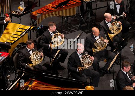 240218-N-PN185-1015 – Blacksburg, Virginia (18 febbraio 2024) – membri della sezione corno francese della United States Navy Band (L-R Senior Chief Tom Wheeler, da Millersburg, Ohio, musicista di prima classe Alex Kovling, da Lewisville, Texas, Master Chief Musician David Kolo, da Milwaukee, Wisconsin Chief Musician Jason Ayoub, da El Paso, Texas, e il musicista capo Nathaniel Willson, di Lake Ann, Michigan) eseguono il concerto finale del tour nazionale dell'unità del 2024 alla Viriginia Tech University. La Navy Band ha viaggiato per 2500 miglia di terra in 18 giorni in 7 stati, ed ha eseguito 12 concerti pubblici come Well Foto Stock