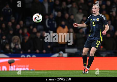 Glasgow, Regno Unito. 26 marzo 2024. Lewis Ferguson della Scozia durante l'amichevole internazionale all'Hampden Park di Glasgow. Il credito per immagini dovrebbe essere: Neil Hanna/Sportimage Credit: Sportimage Ltd/Alamy Live News Foto Stock