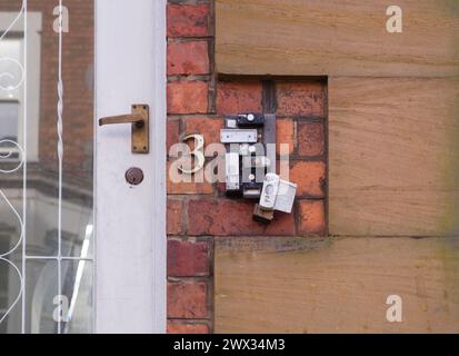 Gruppo di campanelli in un appartamento a Scarborough Foto Stock