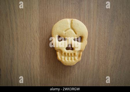 Biscotto a forma di teschio per gli eventi di Halloween Foto Stock