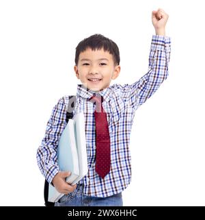 Torna a scuola. Felice studentessa che solleva il braccio Foto Stock