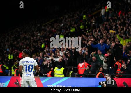 Watford, Regno Unito. 27 marzo 2024. Il Crysencio Summerville del Leeds United celebra il primo gol della squadra durante la partita del Watford FC contro Leeds United FC per il titolo EFL a Vicarage Road, Watford, Inghilterra, Regno Unito il 29 marzo 2024 Credit: Every Second Media/Alamy Live News Foto Stock