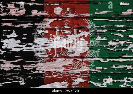Bandiera dell'Afghanistan dipinta su una tavola di legno grunge. Foto Stock