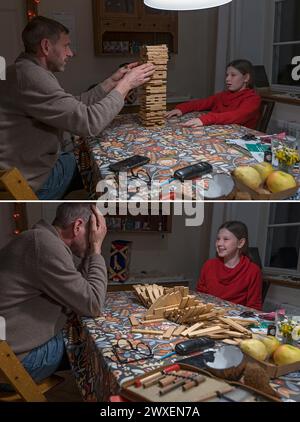 Padre e figlia giocano un gioco di abilità, padre perde, Meclemburgo-Vorpommern, Germania Foto Stock