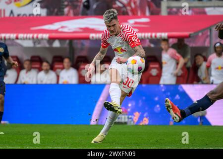 Lipsia, Germania. 30 marzo 2024. Benjamin Sesko (RasenBallsport Leipzig, #30), RB Leipzig vs Mainz 05, 1st Bundesliga, Soccer, DFB, Bundesliga, stagione 2023/2024, red bull arena di lipsia, 30.03. 2024, credito: HMB Media/Uwe Koch/Alamy Live News , Foto Stock