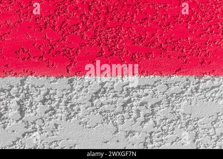 Parete due colori Rosso e bianco disegno astratto sfondo stucco texture Plaster. Foto Stock