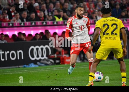 MONACO, Germania. , . 40 Noussair MAZRAOUI di FC Bayern vs 22 Ian MAATSEN durante la partita di calcio della Bundesliga tra FC Bayern Muenchen e Borussia Dortmund, BVB, all'Allianz Arena di Monaco di Baviera il 30. Marzo 2024, Germania. DFL, Fussball, 0:2 (foto e copyright @ Jerry ANDRE/ATP Images) (ANDRE Jerry/ATP/SPP) credito: SPP Sport Press Photo. /Alamy Live News Foto Stock