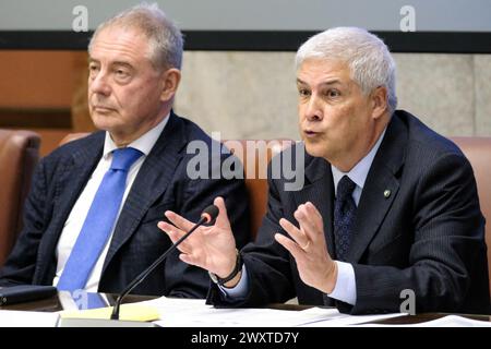 Il Ministro delle imprese e del Made in Italy Adolfo Urso con Roberto Luongo, consigliere del ministro, durante la presentazione della prima giornata del Made in Italy che si Terrà ogni 15 aprile anniversario della nascita di Leonardo da Vinci, evento tenutasi presso il MIMIT a Roma, Martedì 02 aprile 2024 (foto Mauro Scrobogna/LaPresse) il Ministro delle imprese e del Made in Italy Adolfo Urso con Roberto Luongo, consigliere del ministro, durante la presentazione della prima giornata del Made in Italy che si terrà ogni 15 aprile anniversario della nascita di Leonardo da Vinci, evento tenuto al Foto Stock