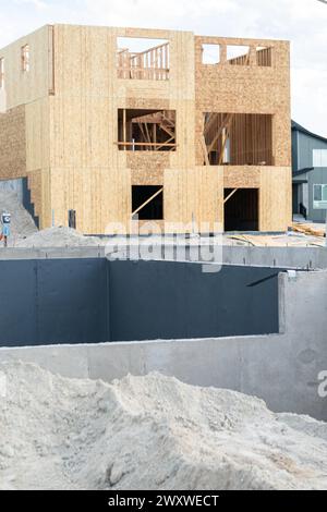 Costruzione di una casa unifamiliare suburbana: Progresso della fase di fondazione Foto Stock