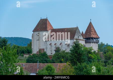 La chiesa fortificata di Bazna in Romania Foto Stock