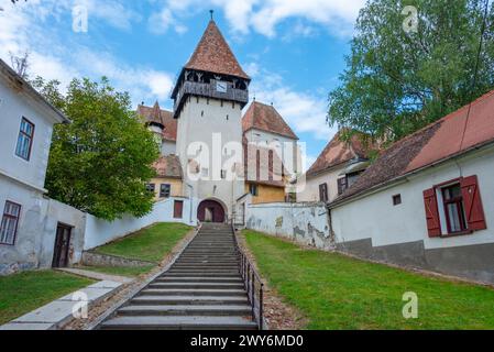 La chiesa fortificata di Bazna in Romania Foto Stock