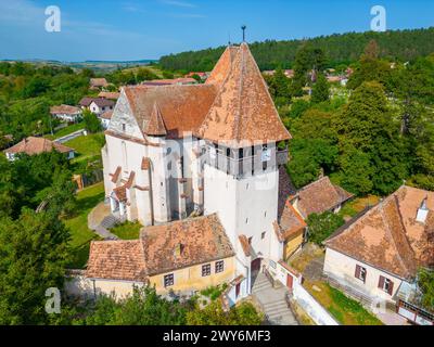 La chiesa fortificata di Bazna in Romania Foto Stock