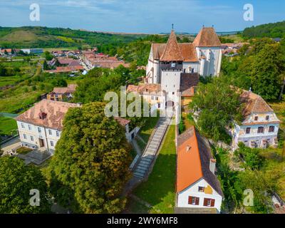 La chiesa fortificata di Bazna in Romania Foto Stock