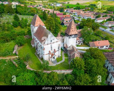 La chiesa fortificata di Bazna in Romania Foto Stock