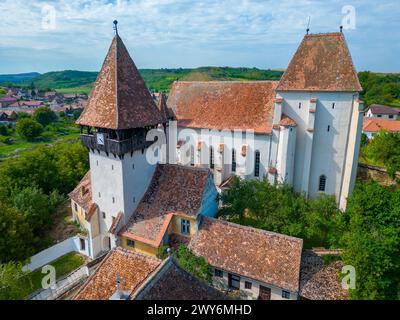 La chiesa fortificata di Bazna in Romania Foto Stock